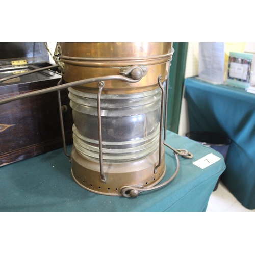 1483 - LARGE COPPER SHIPS LANTERN - THE MARITIME the copper lantern with a glass centre and metal handle, m... 