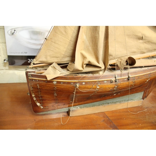 1541 - MODEL OF A BRIXHAM TRAWLER & PRESENTATION CUP - 1890 a detailed model of a Brixham trawler the Daugh... 