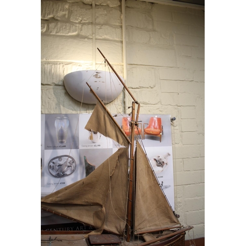 1541 - MODEL OF A BRIXHAM TRAWLER & PRESENTATION CUP - 1890 a detailed model of a Brixham trawler the Daugh... 