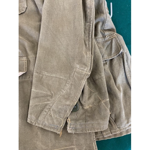 679 - A GERMAN SECOND WORLD WAR OR LATER AFRICA KORPS JACKET.
A pale green German enlisted man's jacket wi... 