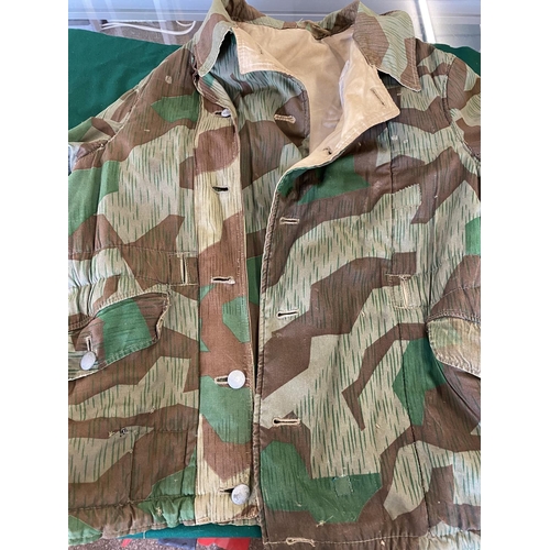 680 - A SECOND WORLD WAR OR LATER GERMAN SPLINTER CAMOUFLAGE JACKET. A heavily lined German 'splinter camo... 