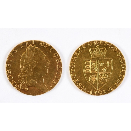 1268A - A GEORGE III  GOLD GUINEA. A George III Guinea, laureate bust r, reverse with spade shaped shield, d... 