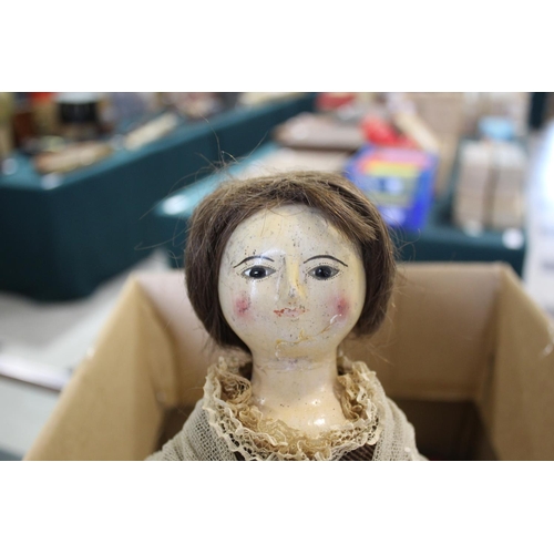 1425 - RARE 18THC ENGLISH WOODEN DOLL an English carved wooden doll with fixed eyes and stitched lashes, or... 