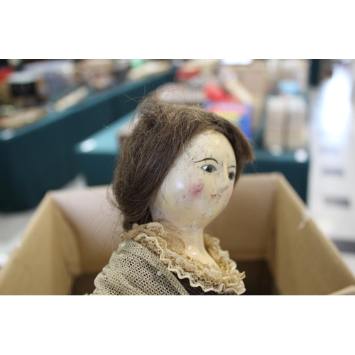 1425 - RARE 18THC ENGLISH WOODEN DOLL an English carved wooden doll with fixed eyes and stitched lashes, or... 