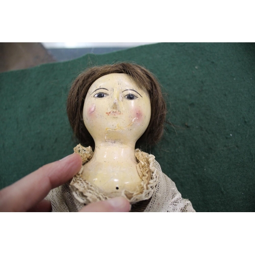 1425 - RARE 18THC ENGLISH WOODEN DOLL an English carved wooden doll with fixed eyes and stitched lashes, or... 