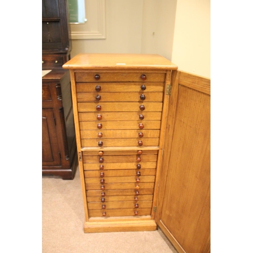 1485 - OAK COLLECTORS CABINET a late 19thc or early 20thc cabinet, with 18 internal drawers (each drawer wi... 