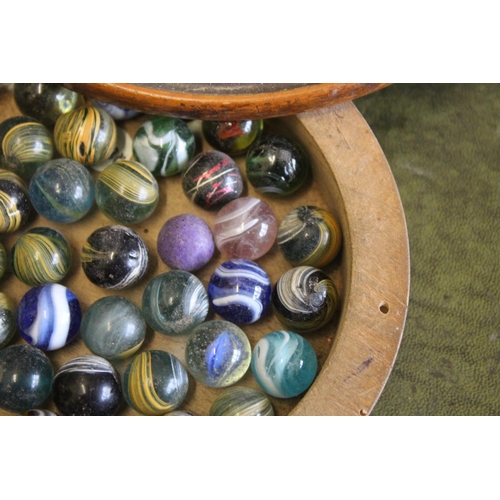 1489 - VINTAGE MARBLES & SOLITAIRE BOARD a solitaire board with a compartment underneath with a variety of ... 