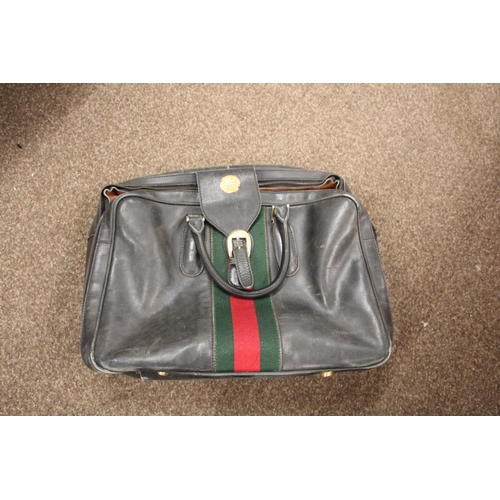 1613 - VINTAGE GUCCI LEATHER LUGGAGE purchased circa 1971, including a leather travelling bag with brass ca... 