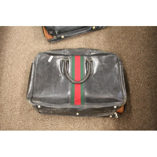 1613 - VINTAGE GUCCI LEATHER LUGGAGE purchased circa 1971, including a leather travelling bag with brass ca... 