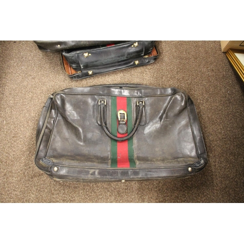 1613 - VINTAGE GUCCI LEATHER LUGGAGE purchased circa 1971, including a leather travelling bag with brass ca... 