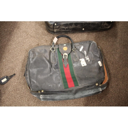 1613 - VINTAGE GUCCI LEATHER LUGGAGE purchased circa 1971, including a leather travelling bag with brass ca... 