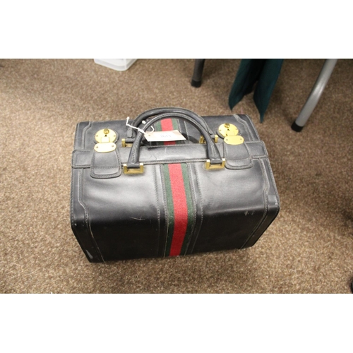 1613 - VINTAGE GUCCI LEATHER LUGGAGE purchased circa 1971, including a leather travelling bag with brass ca... 