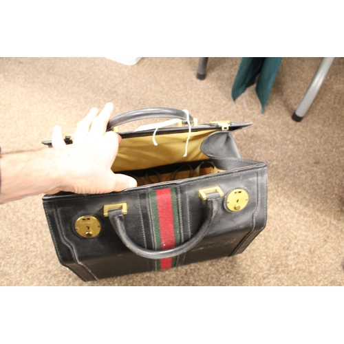 1613 - VINTAGE GUCCI LEATHER LUGGAGE purchased circa 1971, including a leather travelling bag with brass ca... 