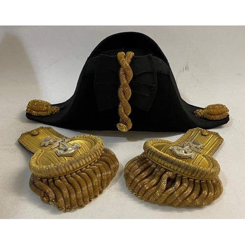 952 - A VICTORIAN NAVAL OFFICERS COCKED HAT, EPAULETTES AND CASE. A Naval Officers cocked hat by Gievves L... 