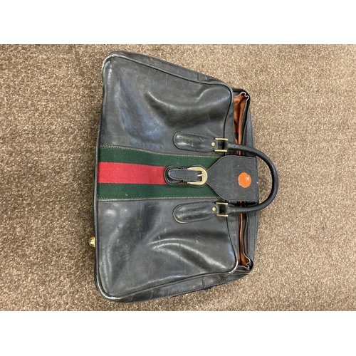 1613 - VINTAGE GUCCI LEATHER LUGGAGE purchased circa 1971, including a leather travelling bag with brass ca... 