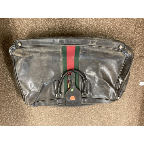 1613 - VINTAGE GUCCI LEATHER LUGGAGE purchased circa 1971, including a leather travelling bag with brass ca... 