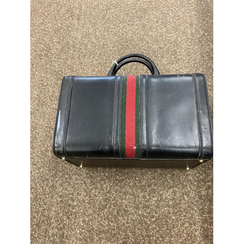 1613 - VINTAGE GUCCI LEATHER LUGGAGE purchased circa 1971, including a leather travelling bag with brass ca... 