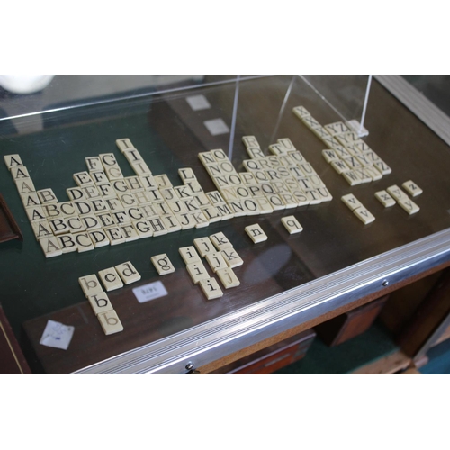 1494 - VINTAGE GAMES including a 19thc vintage alphabet game with bone letters in a small mahogany box, a b... 