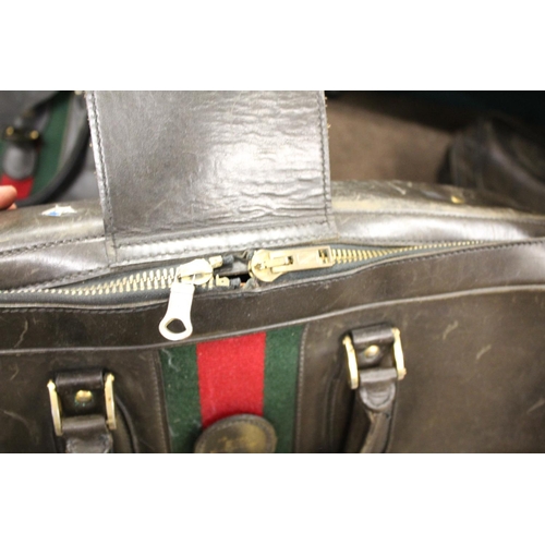 1613 - VINTAGE GUCCI LEATHER LUGGAGE purchased circa 1971, including a leather travelling bag with brass ca... 