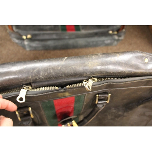 1613 - VINTAGE GUCCI LEATHER LUGGAGE purchased circa 1971, including a leather travelling bag with brass ca... 