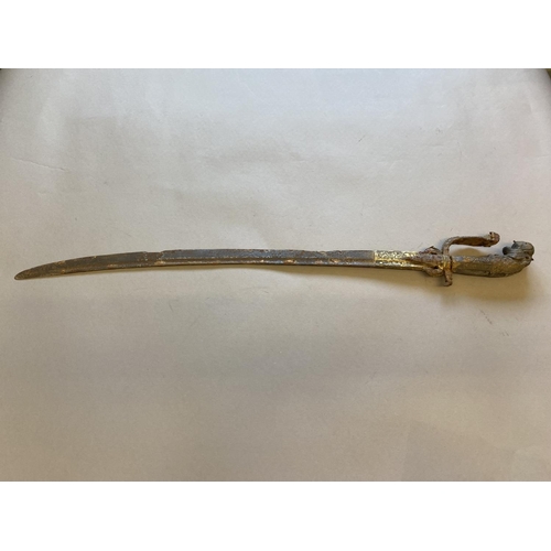 658 - A CEREMONIAL SWORD WITH BRONZE HANDLE, POSSIBLY CEYLONESE AND ANOTHER. The sword with a 58cm curved,... 