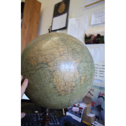 1452 - BACON'S EXCELSIOR TERRESTRIAL GLOBE a 12 inch terrestrial table globe mounted on a turned wooden sta... 