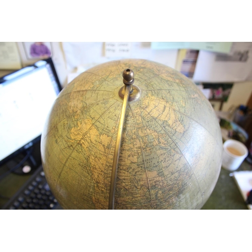 1452 - BACON'S EXCELSIOR TERRESTRIAL GLOBE a 12 inch terrestrial table globe mounted on a turned wooden sta... 