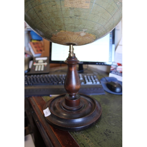 1452 - BACON'S EXCELSIOR TERRESTRIAL GLOBE a 12 inch terrestrial table globe mounted on a turned wooden sta... 