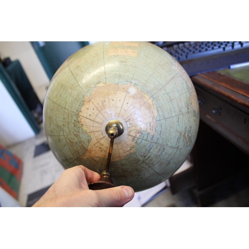 1452 - BACON'S EXCELSIOR TERRESTRIAL GLOBE a 12 inch terrestrial table globe mounted on a turned wooden sta... 