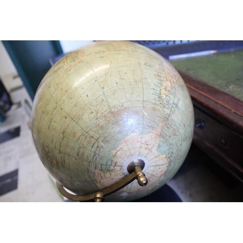 1452 - BACON'S EXCELSIOR TERRESTRIAL GLOBE a 12 inch terrestrial table globe mounted on a turned wooden sta... 