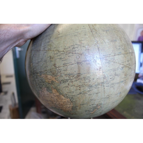 1452 - BACON'S EXCELSIOR TERRESTRIAL GLOBE a 12 inch terrestrial table globe mounted on a turned wooden sta... 