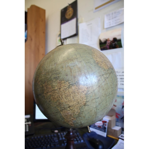 1452 - BACON'S EXCELSIOR TERRESTRIAL GLOBE a 12 inch terrestrial table globe mounted on a turned wooden sta... 