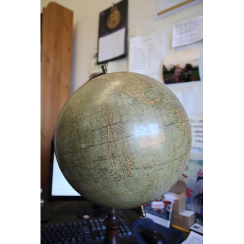 1452 - BACON'S EXCELSIOR TERRESTRIAL GLOBE a 12 inch terrestrial table globe mounted on a turned wooden sta... 