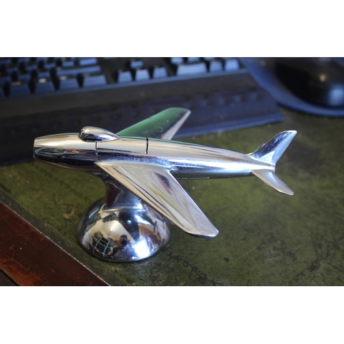 1465 - DUNHILL NOVELY TABLE LIGHTER - AEROPLANE a chrome lighter in the form of an aeroplane, 16cms long... 