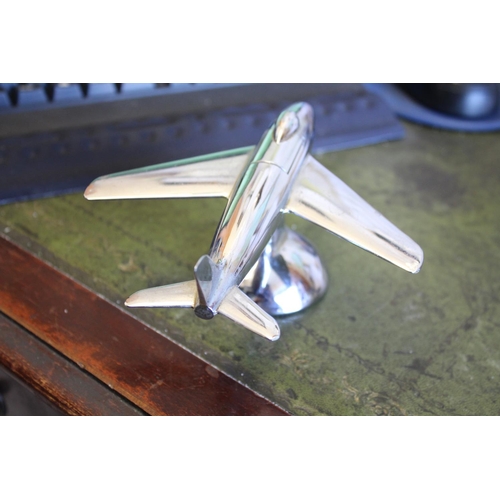 1465 - DUNHILL NOVELY TABLE LIGHTER - AEROPLANE a chrome lighter in the form of an aeroplane, 16cms long... 