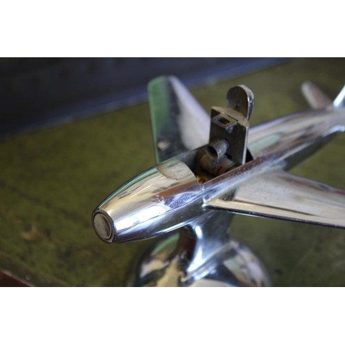 1465 - DUNHILL NOVELY TABLE LIGHTER - AEROPLANE a chrome lighter in the form of an aeroplane, 16cms long... 