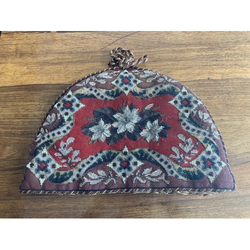 1598 - TWO BEADWORK TEAPOT COVERS  two large beadwork teapot covers or cosies, also with a pair of beadwork... 