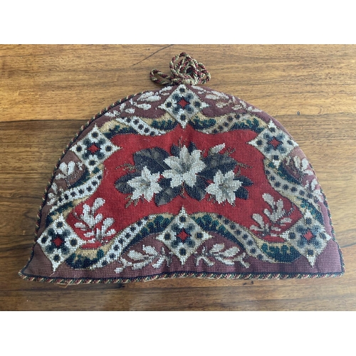 1598 - TWO BEADWORK TEAPOT COVERS  two large beadwork teapot covers or cosies, also with a pair of beadwork... 