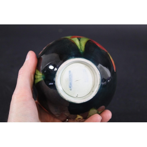 899 - MOORCROFT FLAMBE VASE - ORCHID a squat vase painted in the Orchid design, and with a flambe glaze. M... 