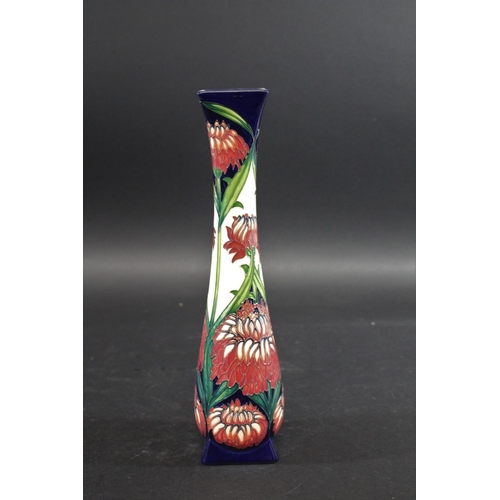 928 - MOORCROFT LIMITED EDITION VASE - FLORIAN TWIST a large slender vase painted with flowers on a white ... 