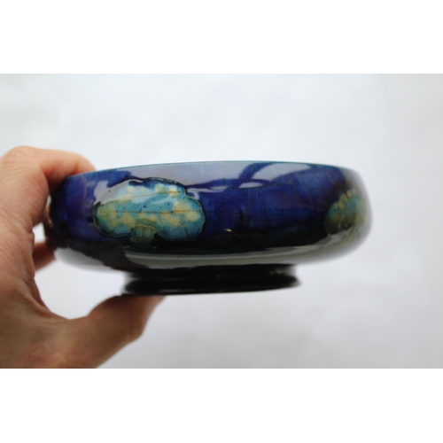 898 - EARLY MOORCROFT BOWL - MOONLIT BLUE a circular bowl painted with trees to the interior and exterior ... 
