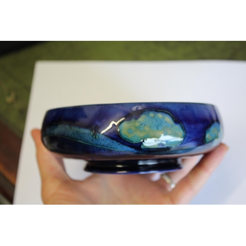 898 - EARLY MOORCROFT BOWL - MOONLIT BLUE a circular bowl painted with trees to the interior and exterior ... 