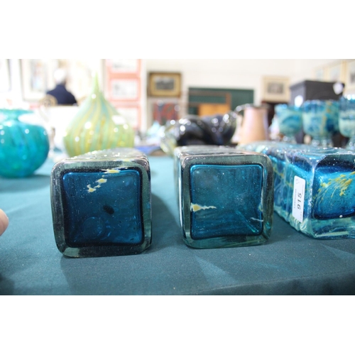915 - MDINA GLASS BOTTLE VASES three large bottle shaped vases, each with slender necks and square shaped ... 