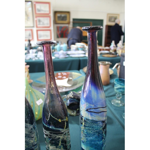 915 - MDINA GLASS BOTTLE VASES three large bottle shaped vases, each with slender necks and square shaped ... 
