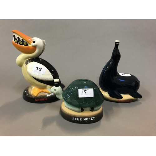 15 - Guinness Seal Money Box, Pelican Money Box and a Tortoise Money Box