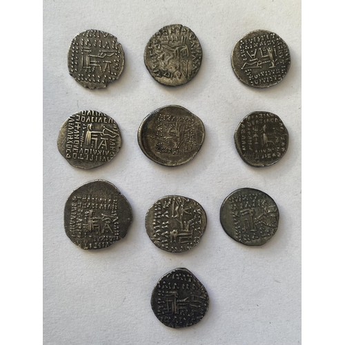 1007 - A COLLECTION OF TEN ANCIENT TYPE SILVER COINS. Ten silver coins, possibly kings of Parthia or later.... 