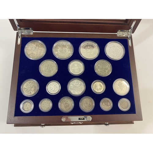 1118 - A 'HOUSE OF WINDSOR SILVER COIN COLLECTION'. A Danbury Mint 'House of Windsor' 18 coin presentation ... 