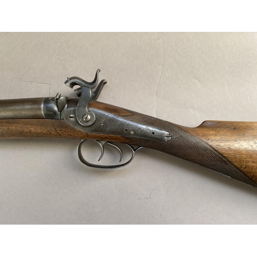 409 - A MUZZLE LOADING 12 BORE TWIN HAMMER SHOTGUN. A 19th Century double barrel shotgun with side-by-side... 