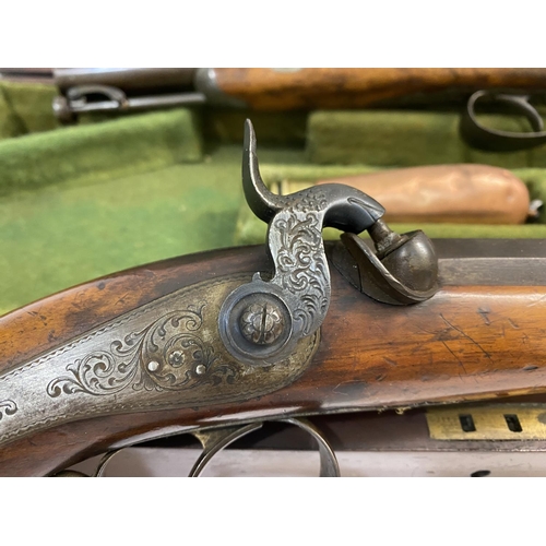 416 - A PAIR OF NINETEENTH CENTURY RIFLED TARGET PISTOL BY TOUREY OF LIEGE. A pair of pistols with 18cm Da... 