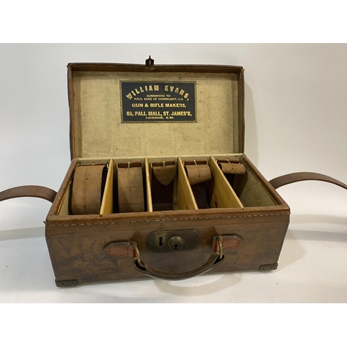 417 - A LEATHER CARTRIDGE CASE BY WILLIAM EVANS OF LONDON. A leather cartridge case, with brass mounted co... 